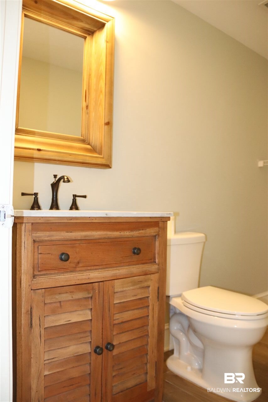 1517 Regency Road, Unit 122 Gulf Shores, AL 36542 - Photo 8 of 37 Downstairs Half Bath w/La