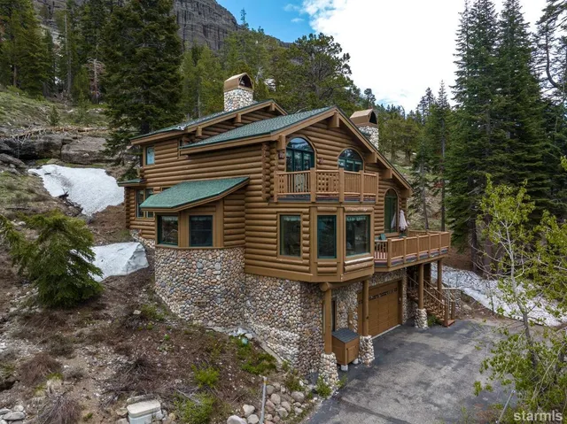 a front view of house with yard outdoor seating and green space