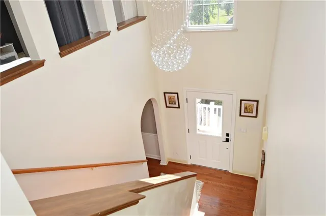 a view of a hallway with a window