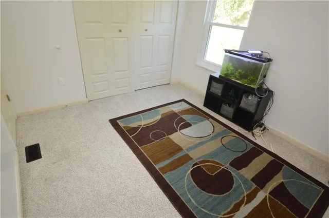 view of living room with furniture and a window