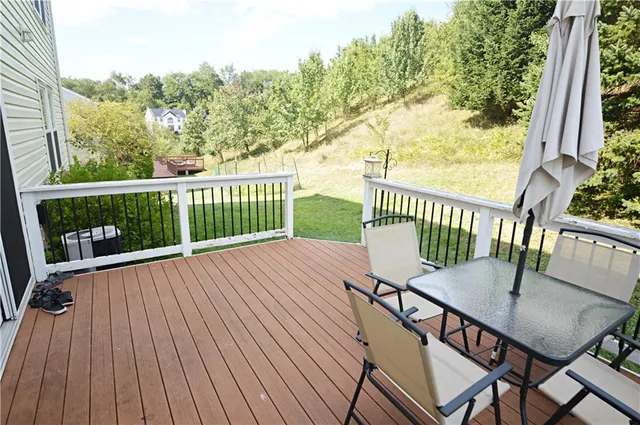 a view of balcony with furniture