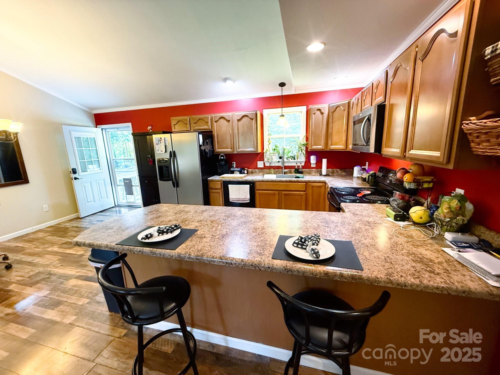 130 Kankel Drive Rutherfordton, NC 28139 - Photo 11 of 21 a dinning table and chairs in a kitchen