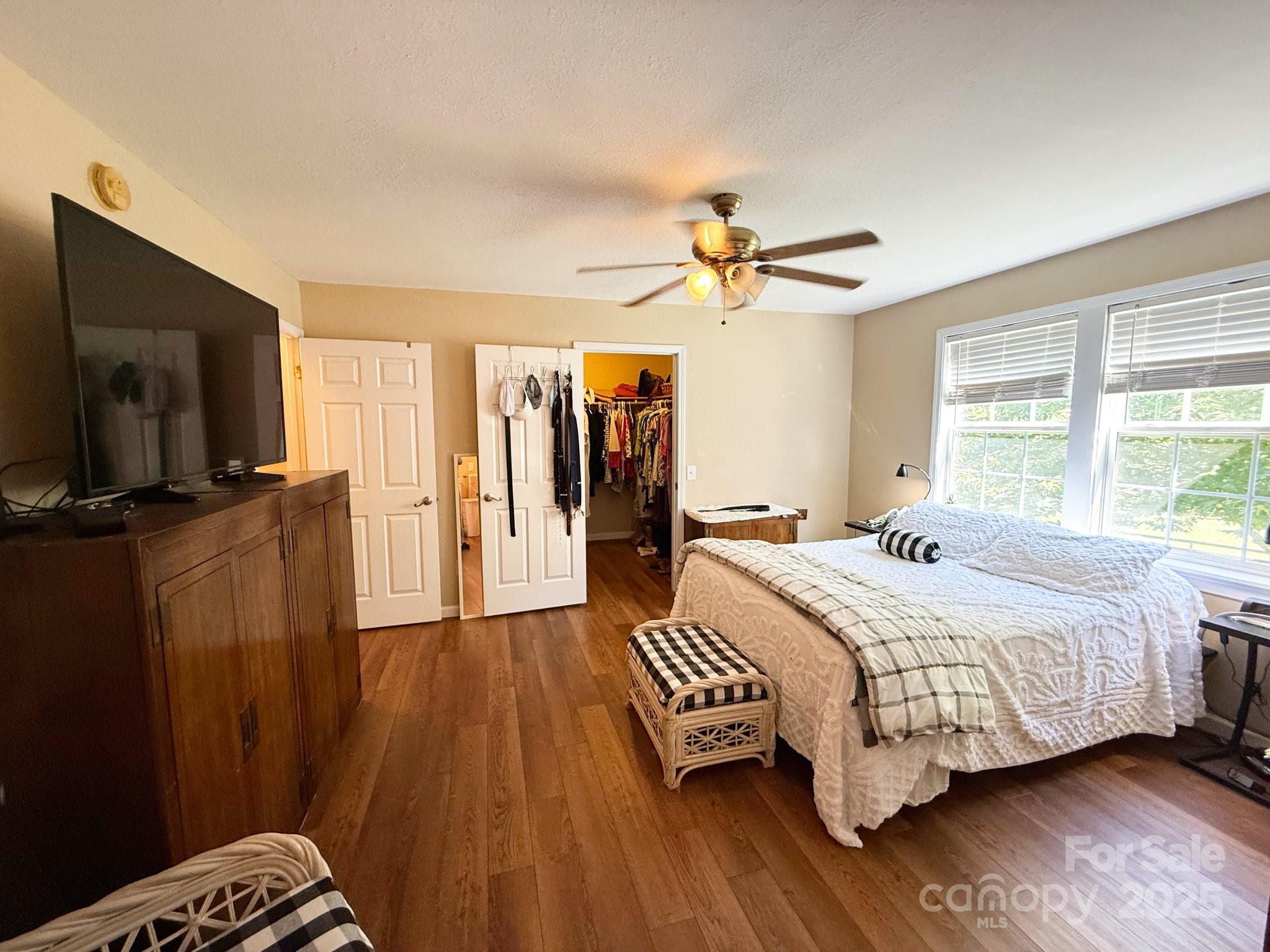 130 Kankel Drive Rutherfordton, NC 28139 - Photo 14 of 21 a bedroom with a bed and a flat screen tv