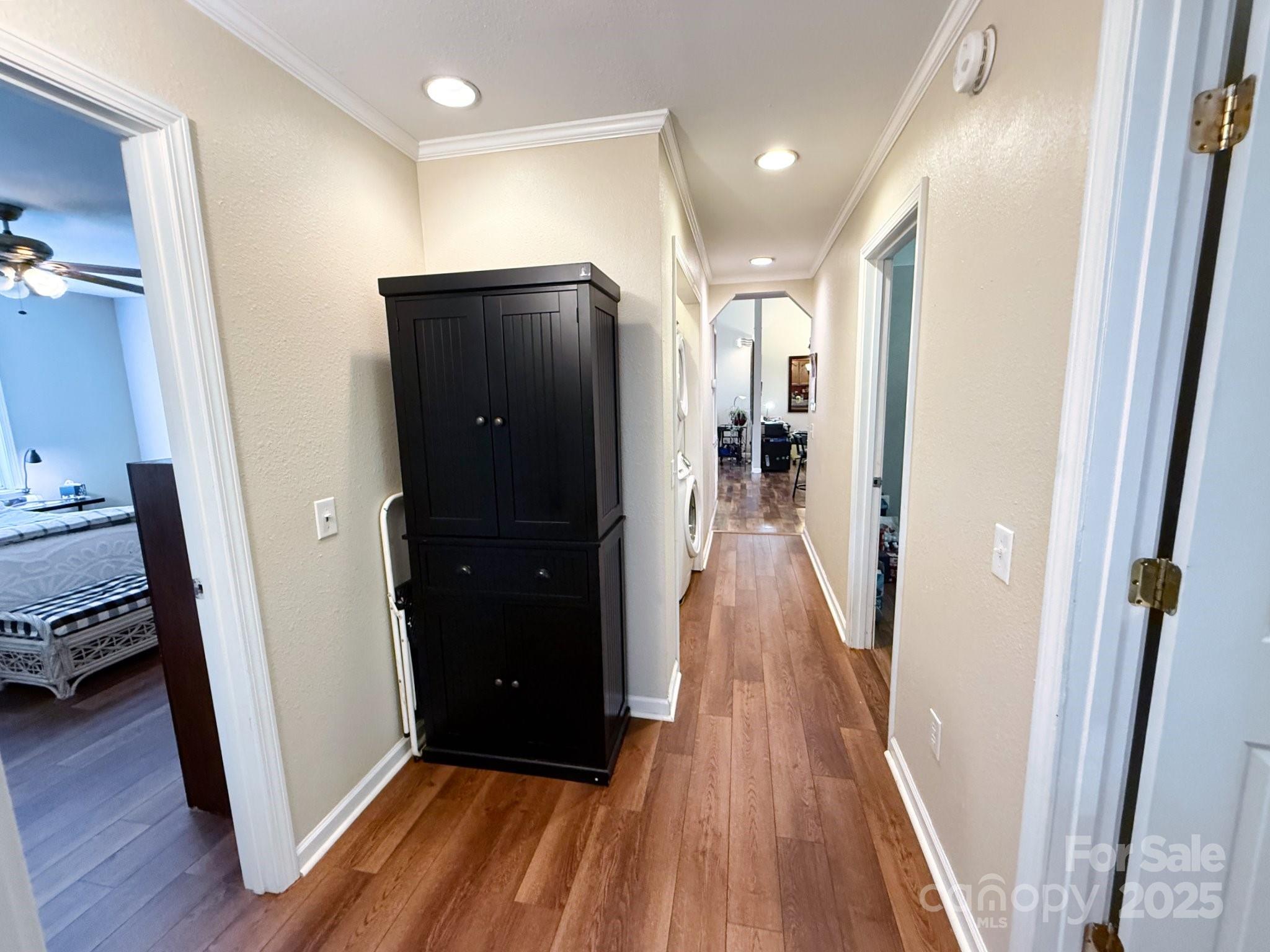 130 Kankel Drive Rutherfordton, NC 28139 - Photo 20 of 21 a view of a hallway with wooden floor and staircase