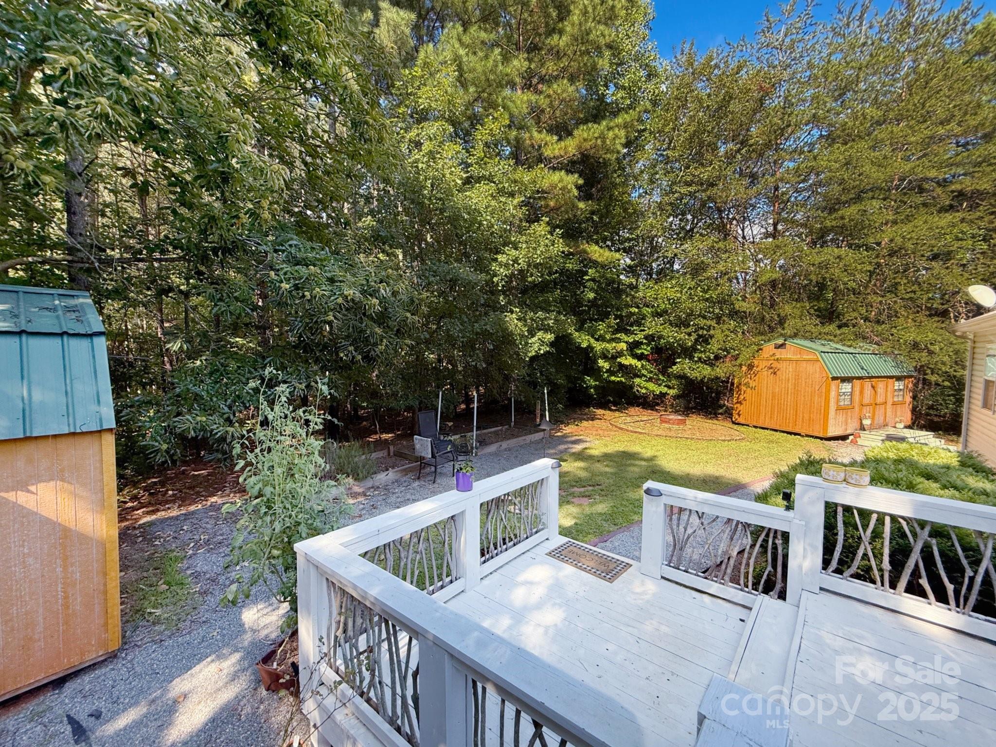 130 Kankel Drive Rutherfordton, NC 28139 - Photo 7 of 21 a view of roof deck with two chairs and a table