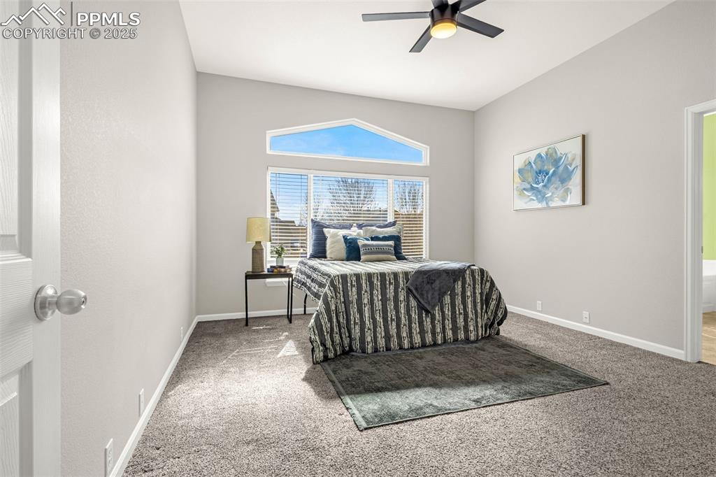 12383 Pine Valley Circle Peyton, CO 80831 - Photo 11 of 45 a bedroom with a bed and window
