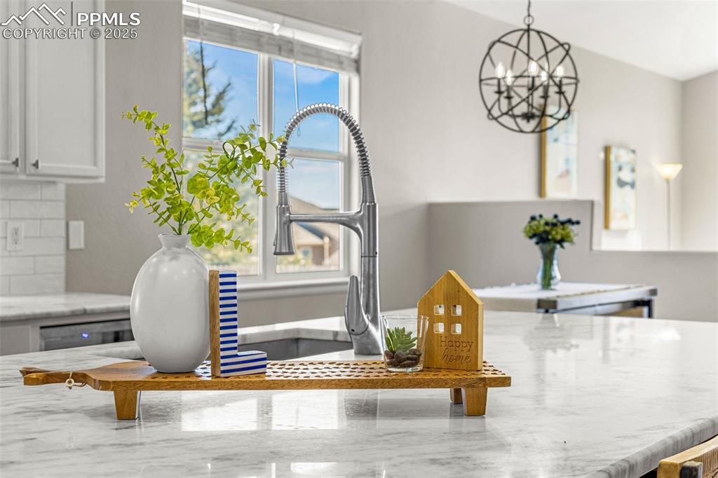 12383 Pine Valley Circle Peyton, CO 80831 - Photo 21 of 45 a vase of flowers sitting on a table