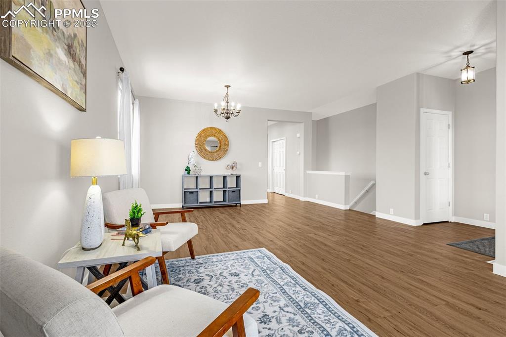 12383 Pine Valley Circle Peyton, CO 80831 - Photo 3 of 45 a living room with furniture and a table