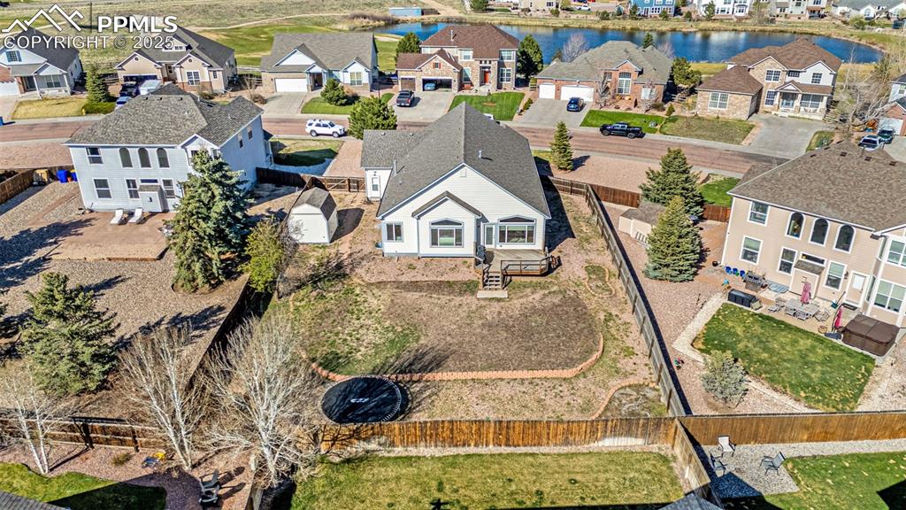 12383 Pine Valley Circle Peyton, CO 80831 - Photo 34 of 45 an aerial view of residential houses with outdoor space