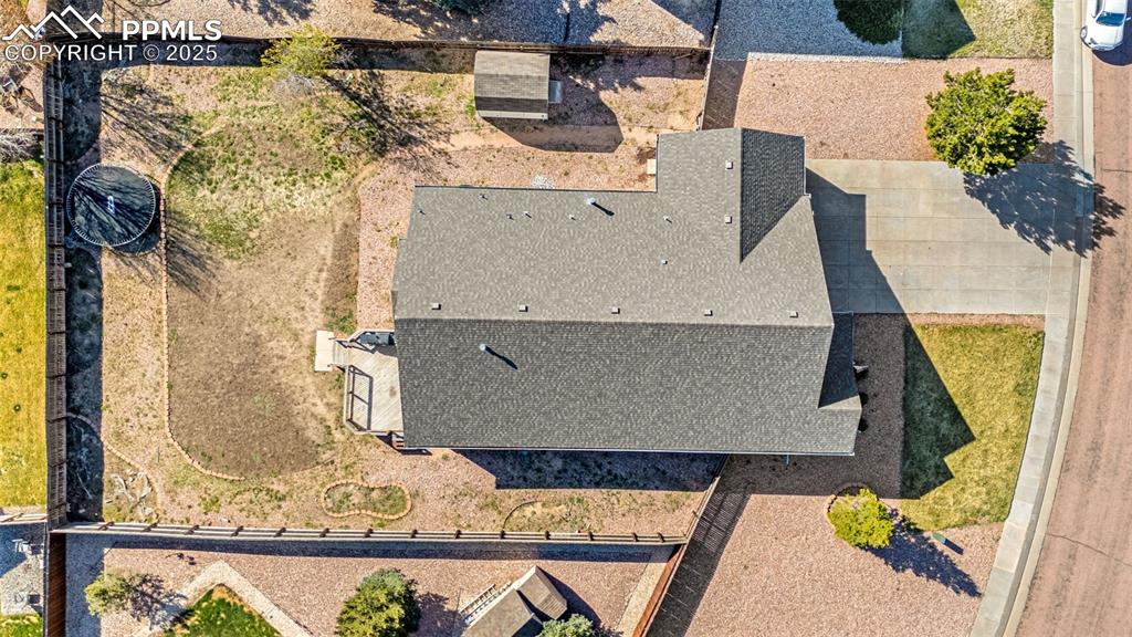 12383 Pine Valley Circle Peyton, CO 80831 - Photo 38 of 45 an aerial view of a house with a swimming pool
