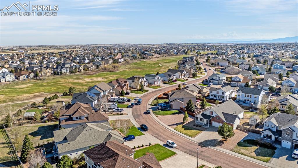 12383 Pine Valley Circle Peyton, CO 80831 - Photo 39 of 45 an aerial view of residential building and lake