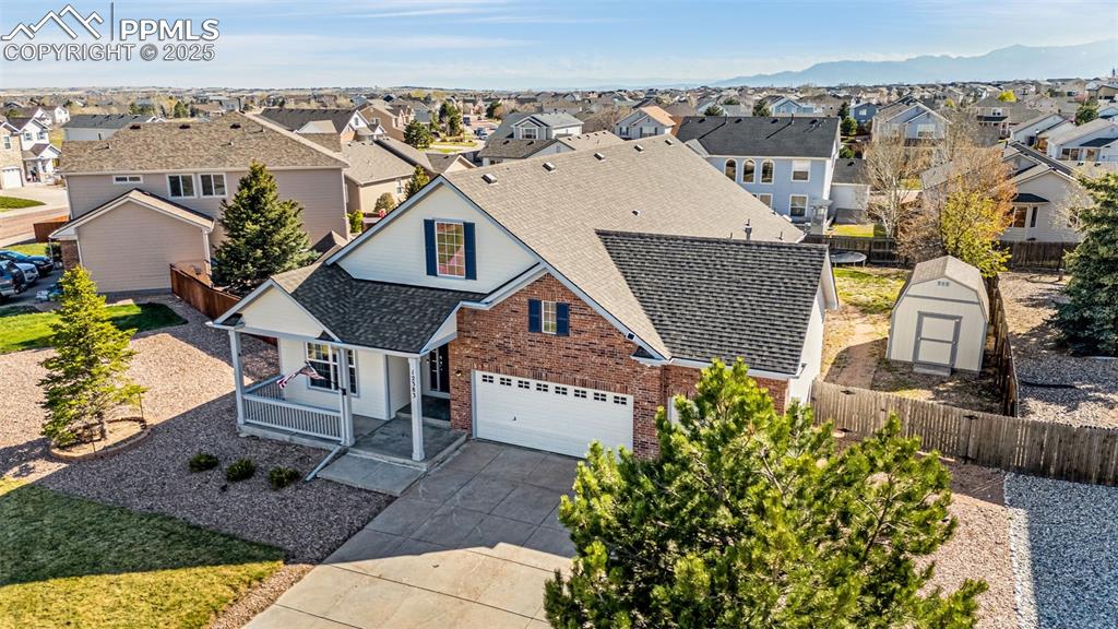 12383 Pine Valley Circle Peyton, CO 80831 - Photo 44 of 45 an aerial view of a house with a yard