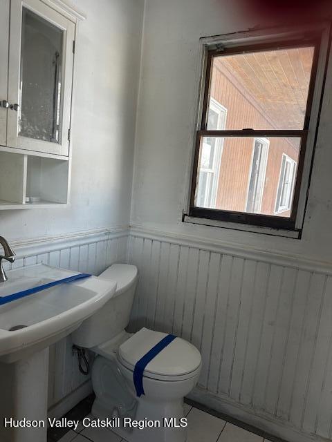 15 Amherst Road Red Hook, NY 12571 - Photo 15 of 25 a white toilet sitting next to a bathroom sink