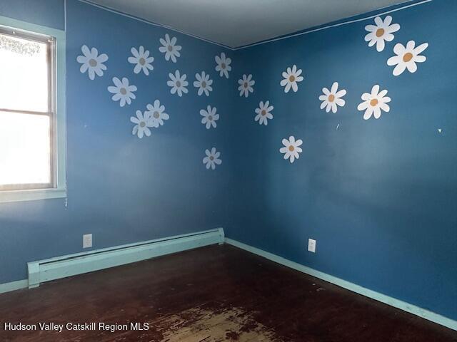 15 Amherst Road Red Hook, NY 12571 - Photo 22 of 25 a view of a room with chandelier fan and wooden floor