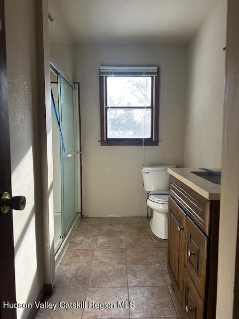 15 Amherst Road Red Hook, NY 12571 - Photo 24 of 25 a bathroom with a sink a toilet and a mirror