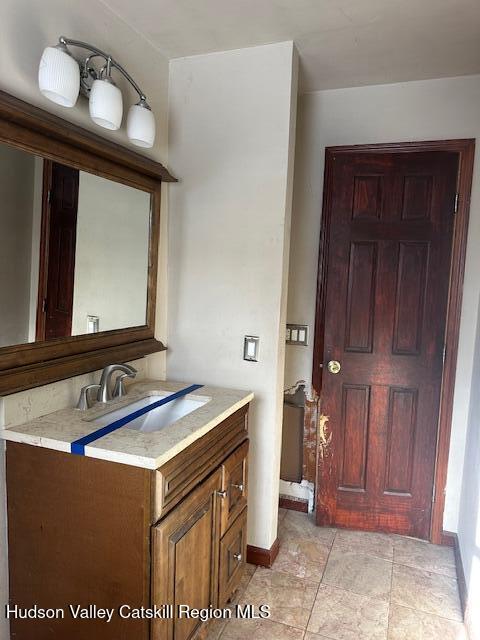 15 Amherst Road Red Hook, NY 12571 - Photo 25 of 25 a bathroom with a sink vanity and a mirror