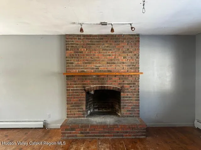a view of fireplace and utility room