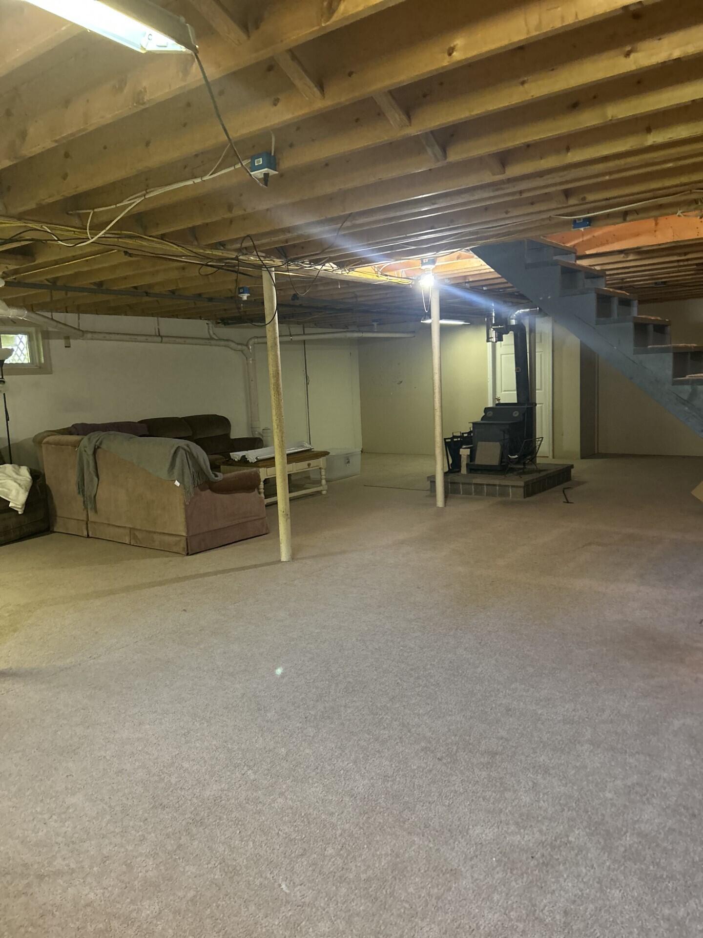 5 Summit Street Jay, ME 04239 - Photo 31 of 31 0395 full basement with wood stove