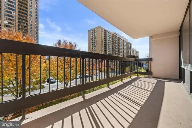 a view of balcony with wooden floor