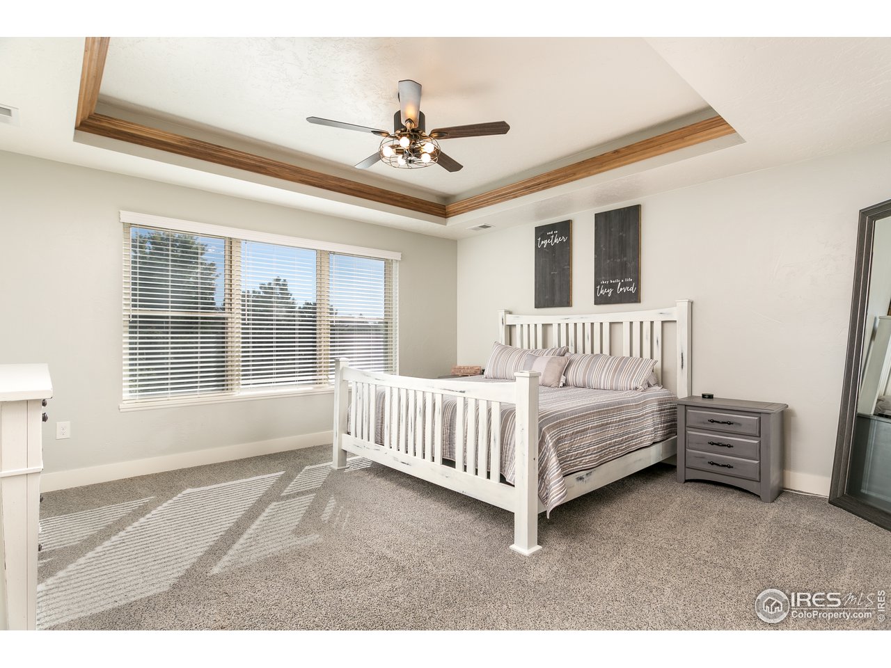 1445 Falcon Ridge Road Eaton, CO 80615 - Photo 23 of 40 Master Suite w/ Accented Cove Ceiling