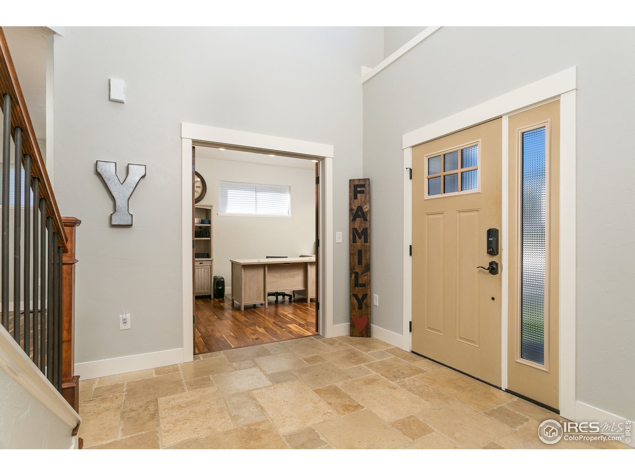 1445 Falcon Ridge Road Eaton, CO 80615 - Photo 5 of 40 Large Bright Entry w/ Vaulted Ceilings