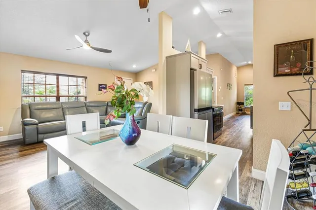 a kitchen with a refrigerator stove and microwave