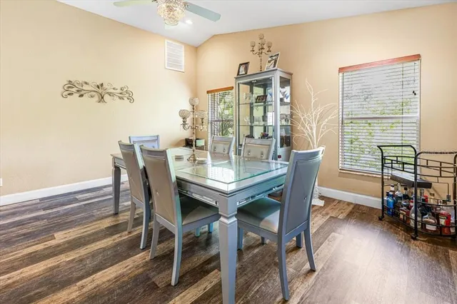 a bedroom with a bed and a table