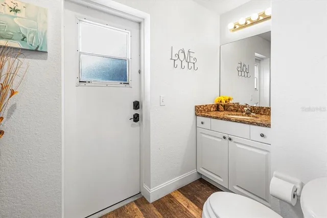 a view of a swimming pool with a patio