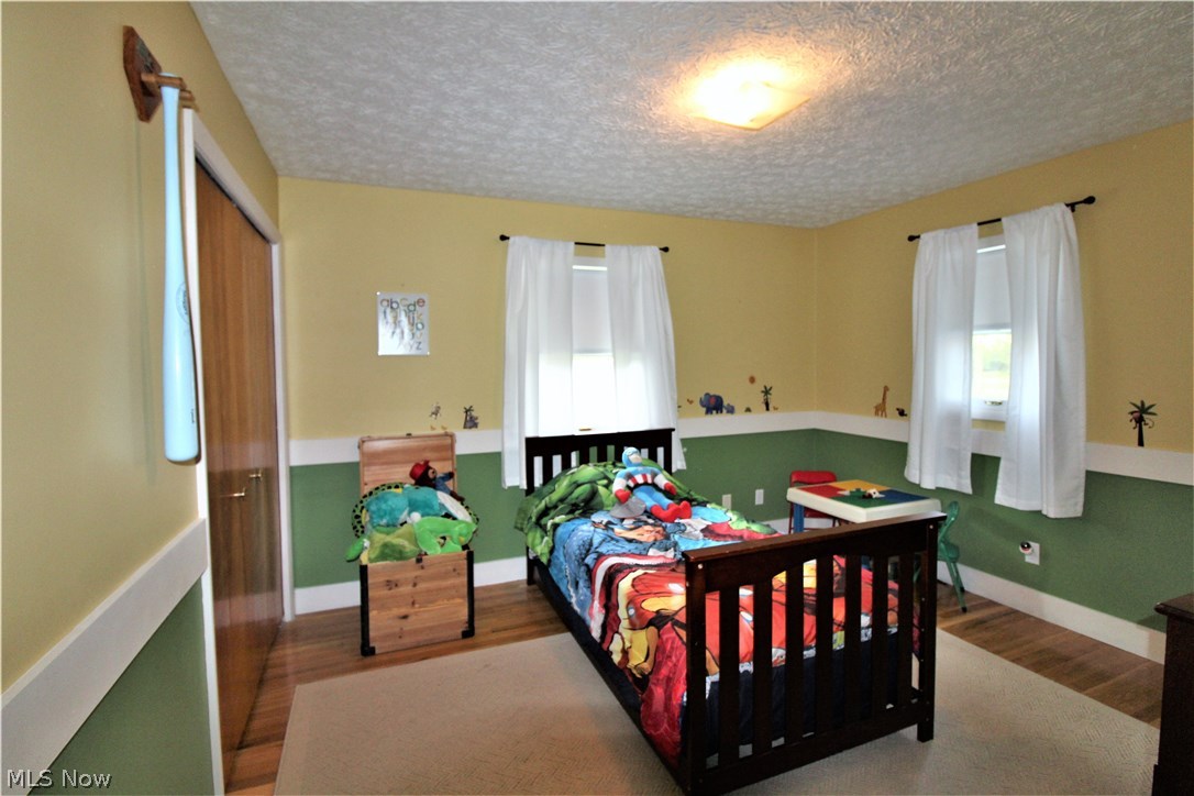 2887 Lee Road Silver Lake, OH 44224 - Photo 17 of 24 Bedroom 4 with Hardwood Floor