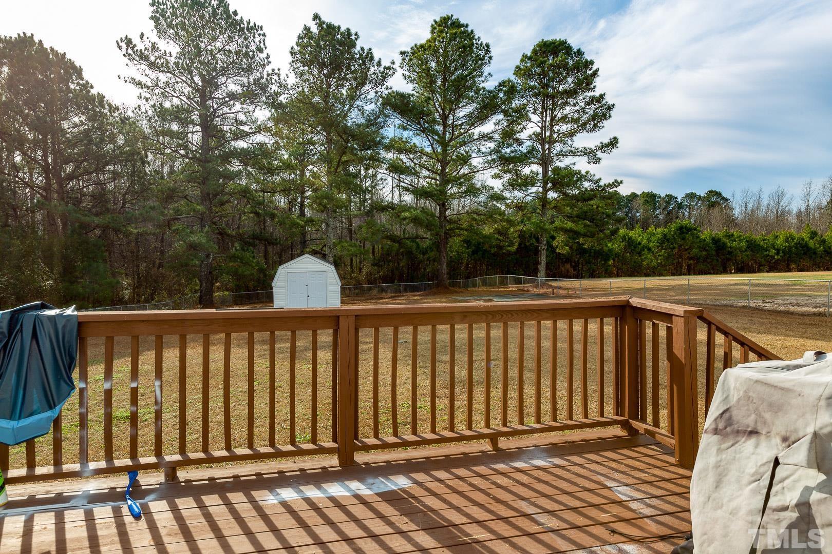 1558 Langdon Road Angier, NC 27501 - Photo 23 of 25 a view of outdoor space with deck and yard
