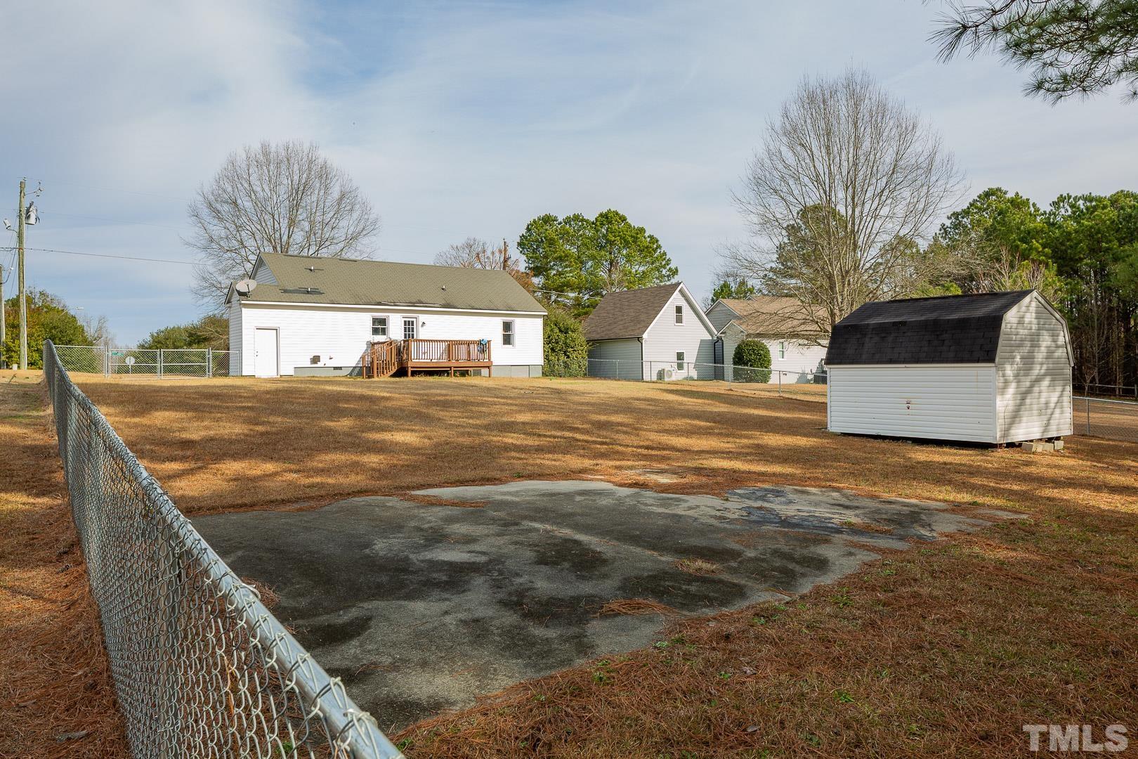 1558 Langdon Road Angier, NC 27501 - Photo 25 of 25 a view of a house with a outdoor space