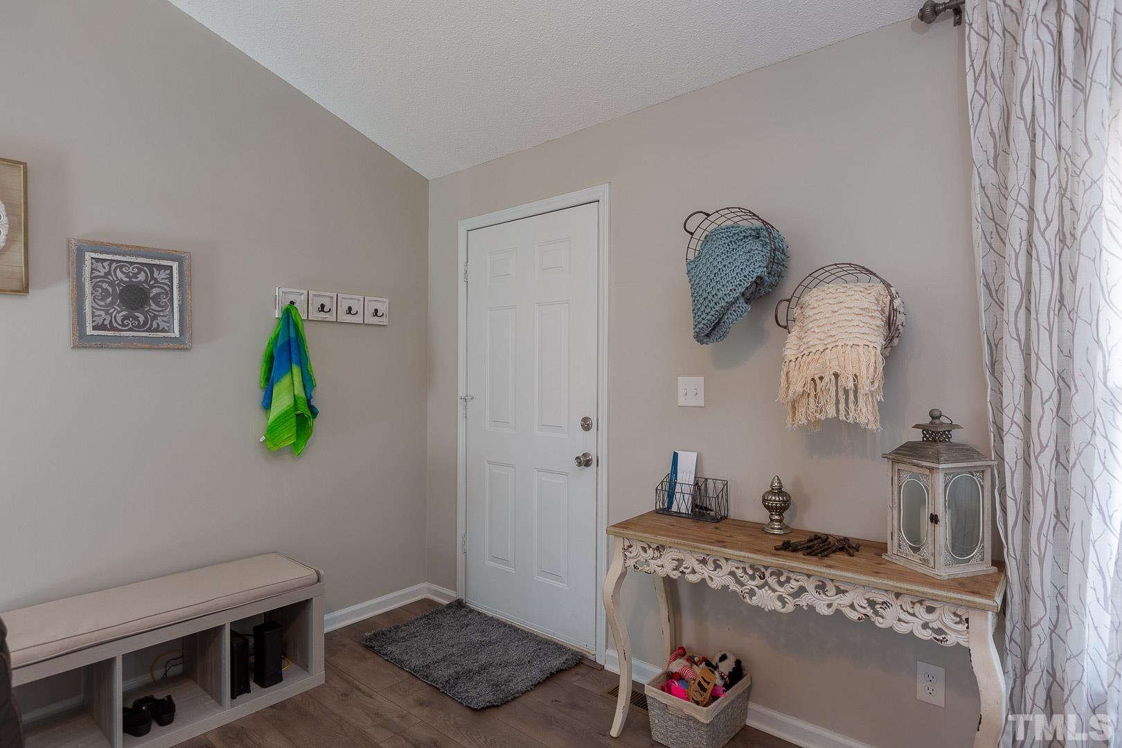 1558 Langdon Road Angier, NC 27501 - Photo 7 of 25 a bathroom with a granite countertop sink and a mirror