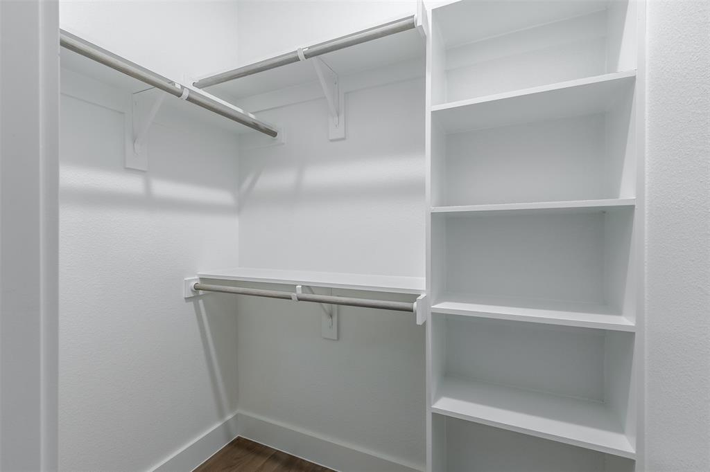 1144 Lavender Ridge Dallas, TX 75204 - Photo 14 of 18 a view of an empty walk in closet