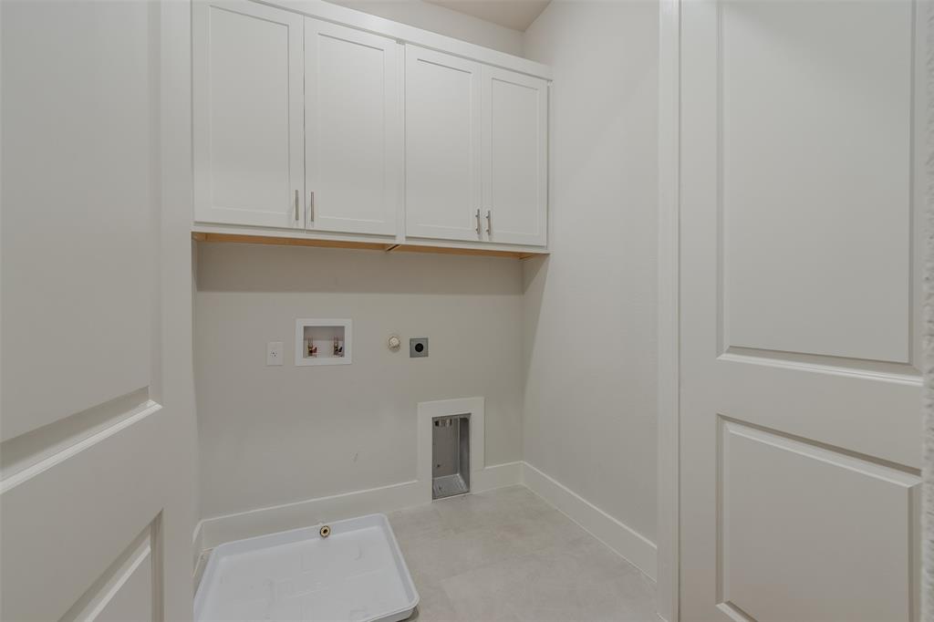 1144 Lavender Ridge Dallas, TX 75204 - Photo 16 of 18 a bathroom with a toilet and a sink