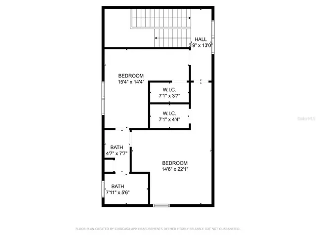 a picture of a bench in front of a wall