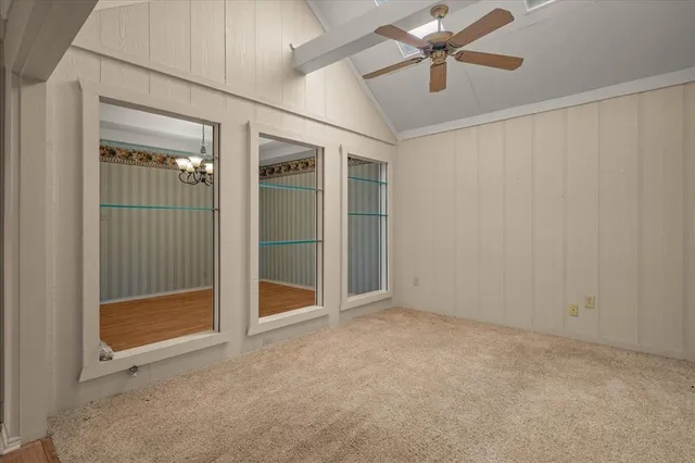 an empty room with fan