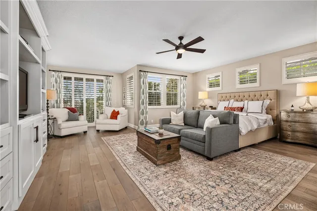 a bathroom with a bathtub shower and sink