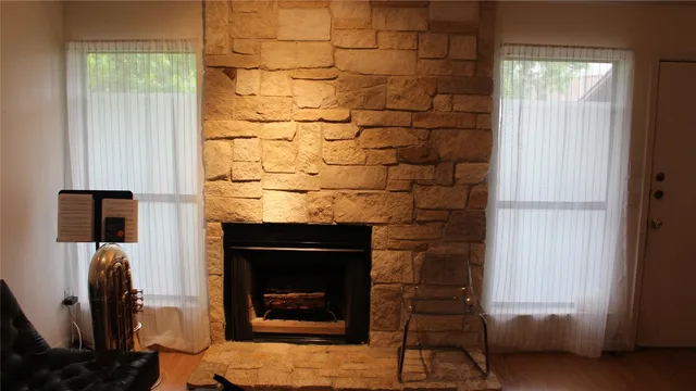 a living room with a fireplace