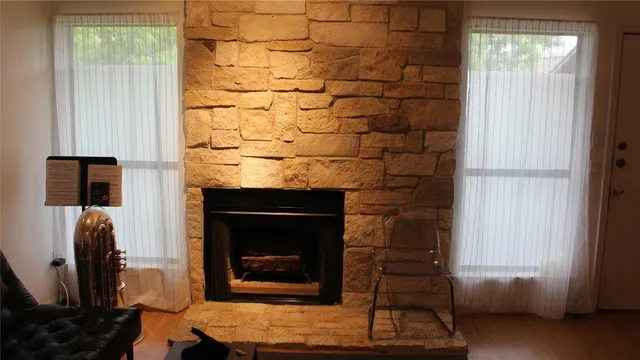 a living room with a fireplace