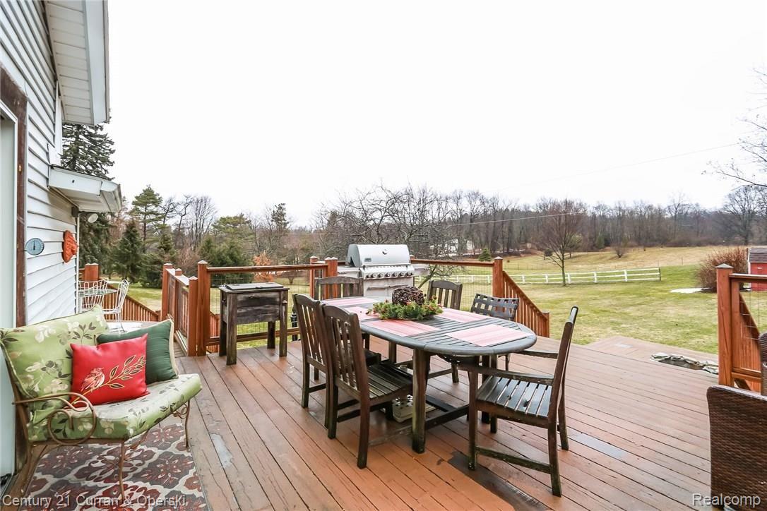 5810 North Tipsico Lake Road Holly, MI 48442 - Photo 28 of 31 Back Deck looking over 6+ acres.