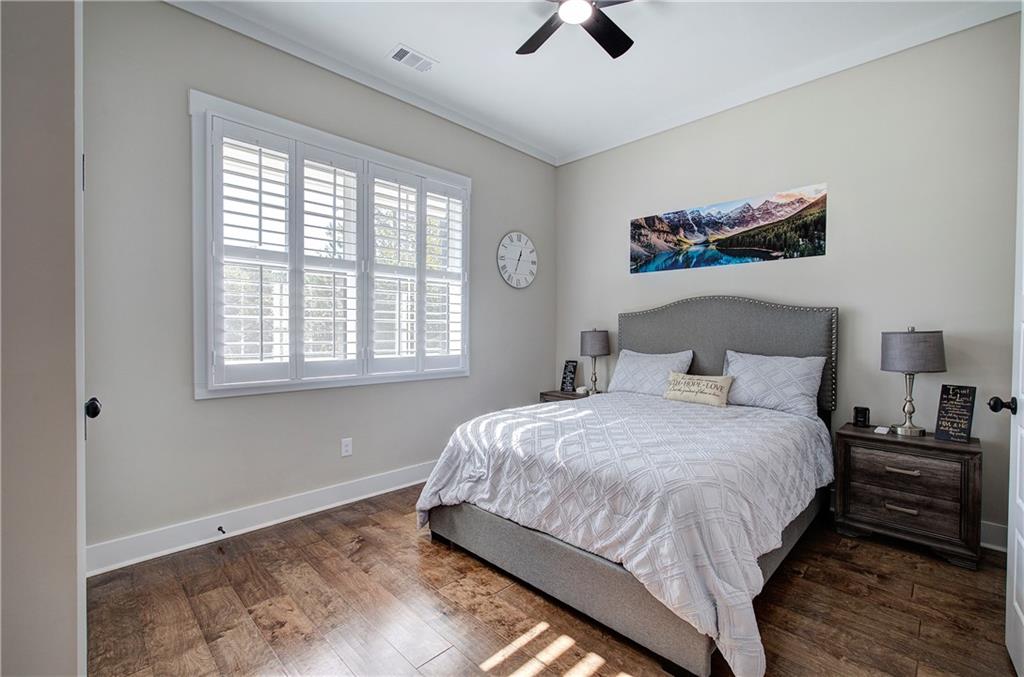 503 London Road Ball Ground, GA 30107 - Photo 33 of 55 a bedroom with a bed and a window