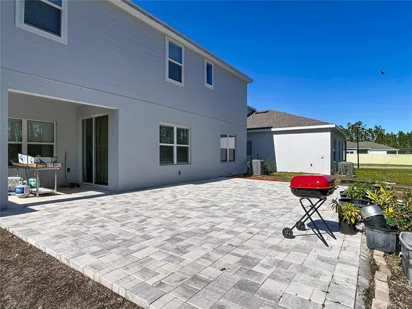 a view of a backyard of a house