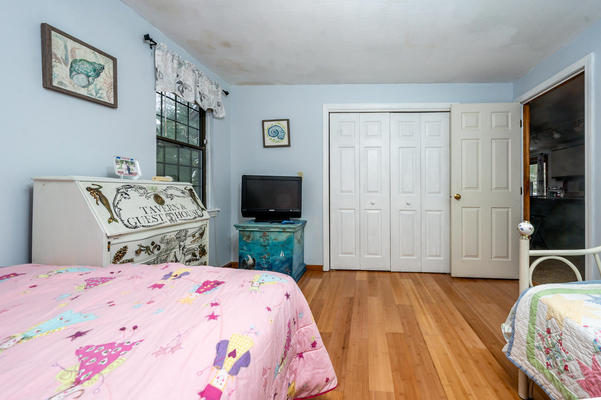 192 Sandy Valley Road Marstons Mills, MA 02648 - Photo 24 of 36 a bedroom with a bed and a flat screen tv