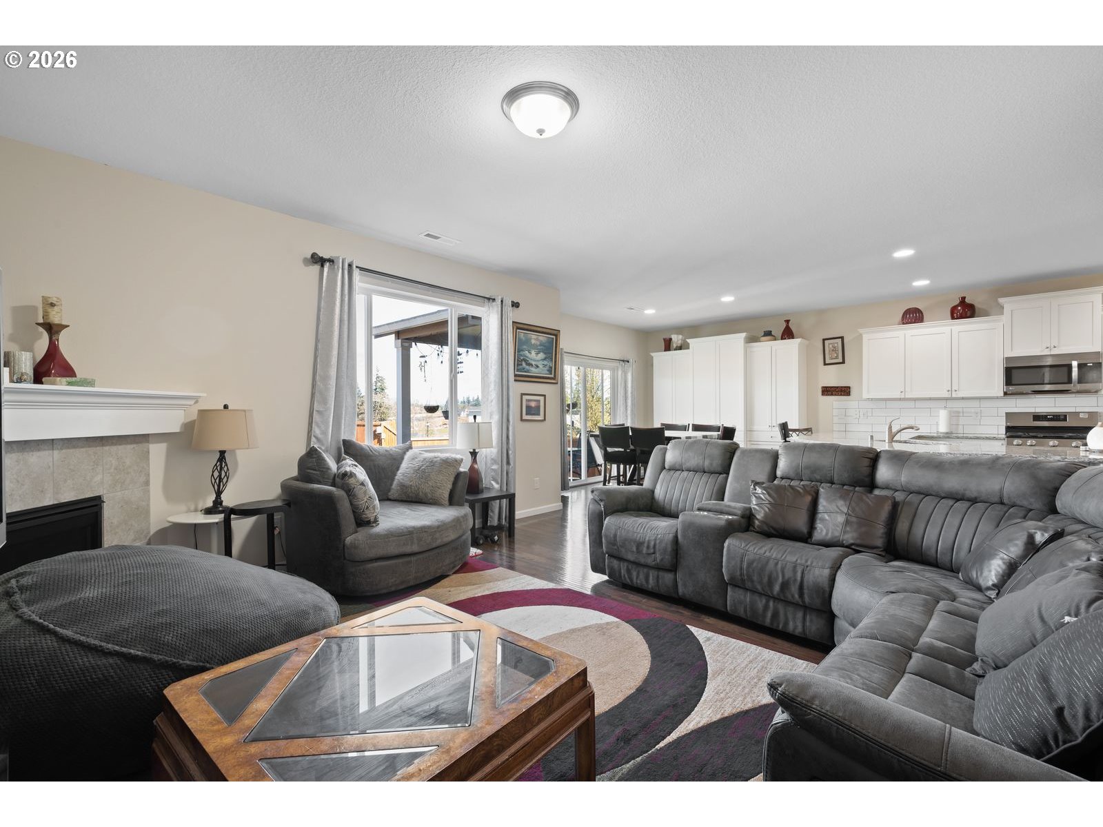 3676 North 10th Street Ridgefield, WA 98642 - Photo 15 of 37 a living room with furniture and a fireplace