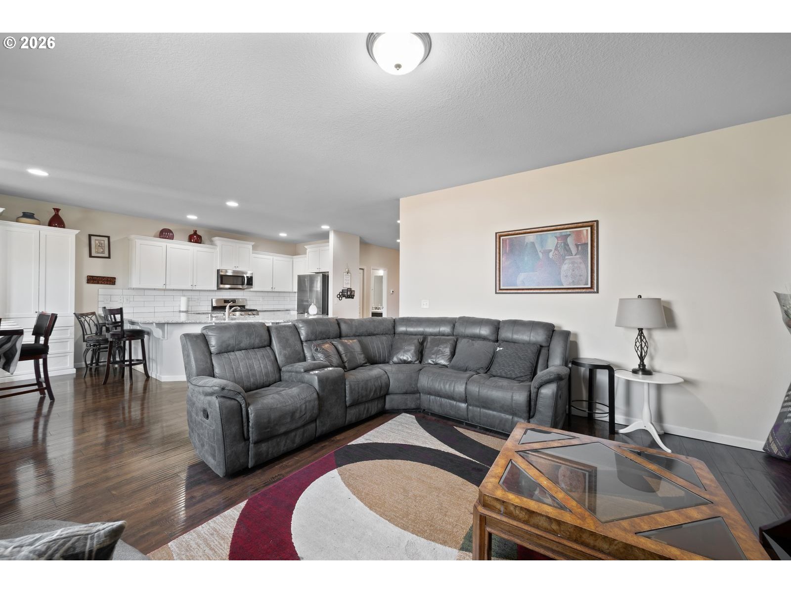 3676 North 10th Street Ridgefield, WA 98642 - Photo 16 of 37 a living room with furniture and kitchen view