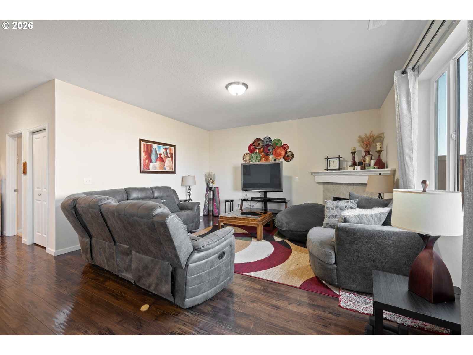 3676 North 10th Street Ridgefield, WA 98642 - Photo 17 of 37 a living room with furniture and a large window