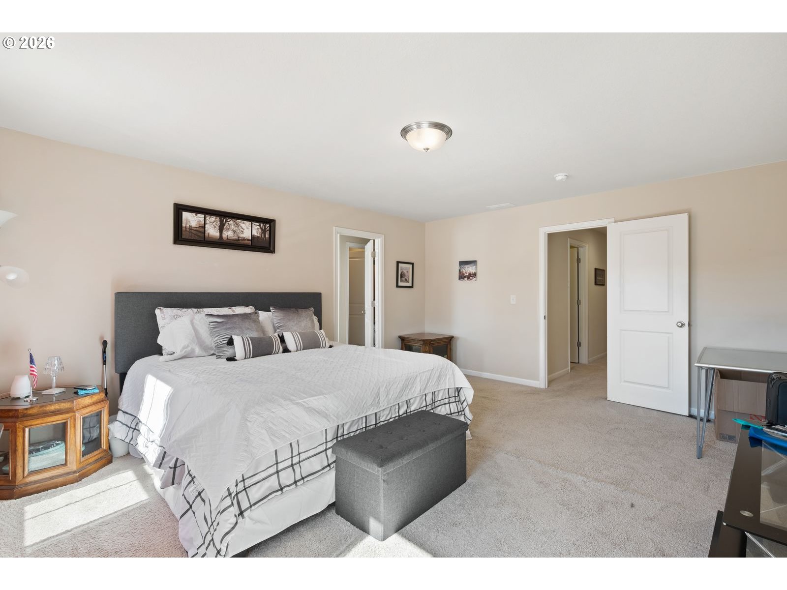 3676 North 10th Street Ridgefield, WA 98642 - Photo 20 of 37 a bedroom with a bed and a view of kitchen