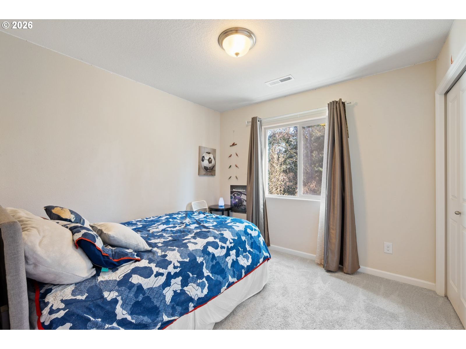 3676 North 10th Street Ridgefield, WA 98642 - Photo 23 of 37 a bedroom with a bed and a window
