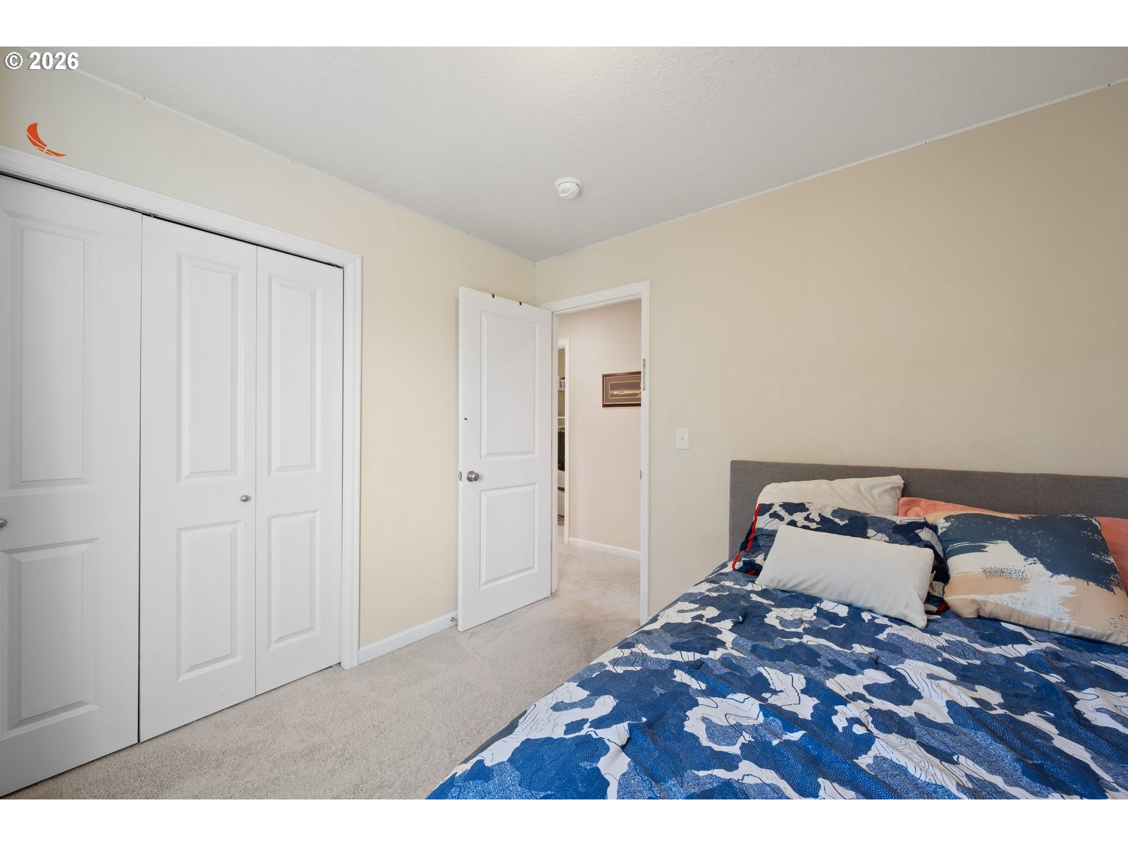 3676 North 10th Street Ridgefield, WA 98642 - Photo 24 of 37 a bedroom with a bed and a cabinets