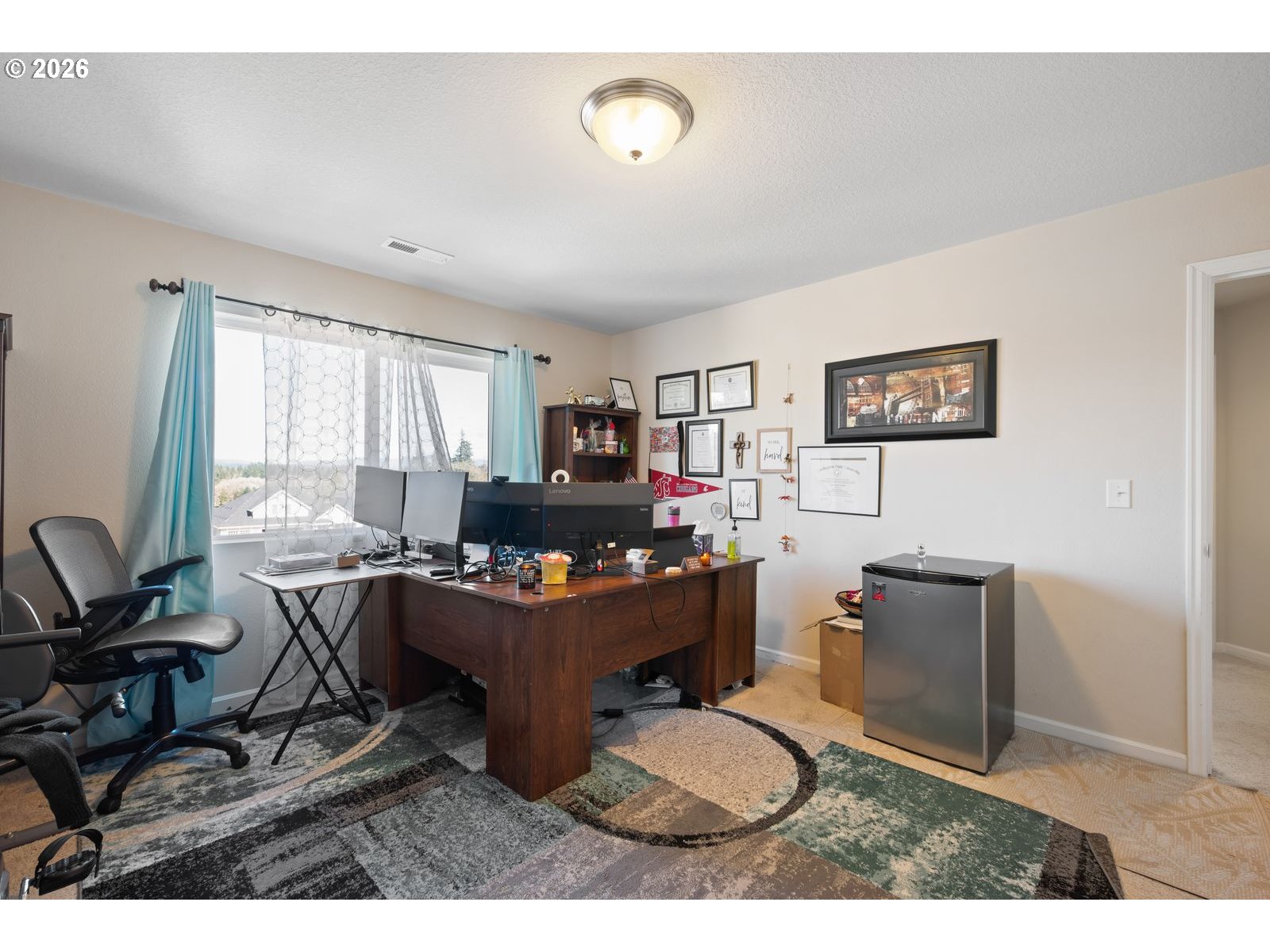 3676 North 10th Street Ridgefield, WA 98642 - Photo 27 of 37 a workspace with furniture and window